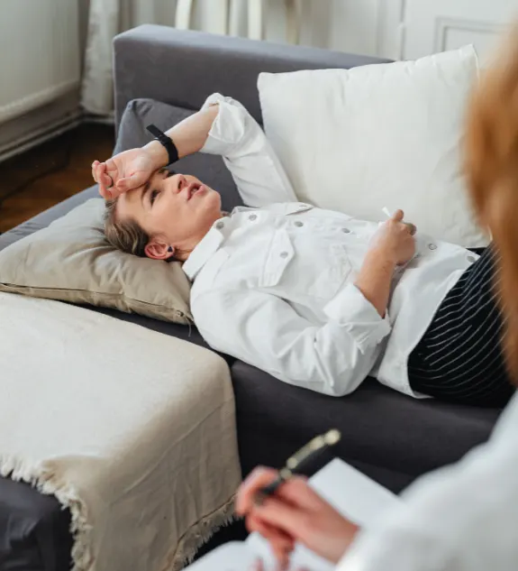 Girl Lying On Sofa Consulting With Therapists